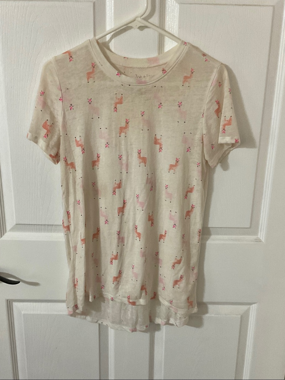 Zoe + Liv Cream Short Sleeve Tee with Pink Llama Print